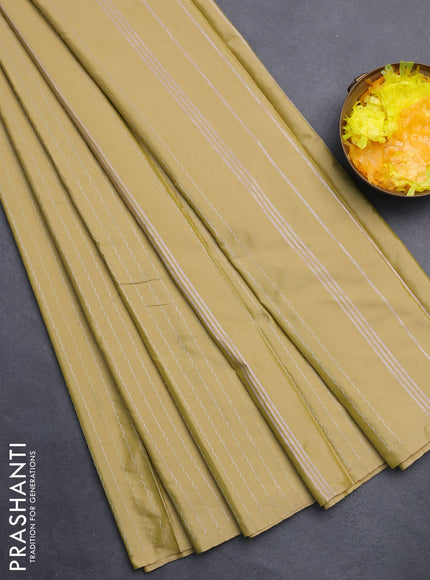 Arani semi silk saree elaichi green with allover silver zari weaves in borderless style