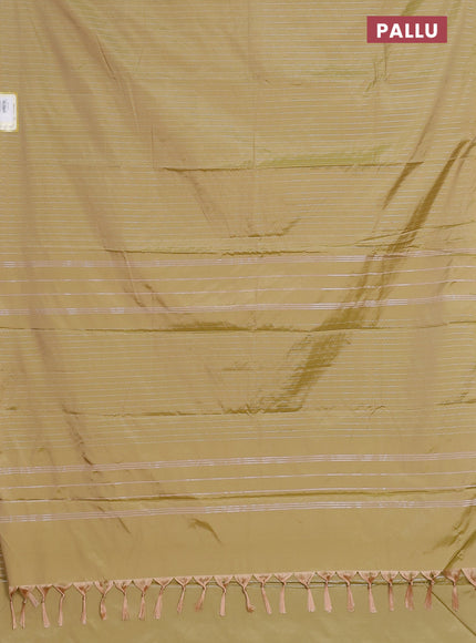 Arani semi silk saree elaichi green with allover silver zari weaves in borderless style