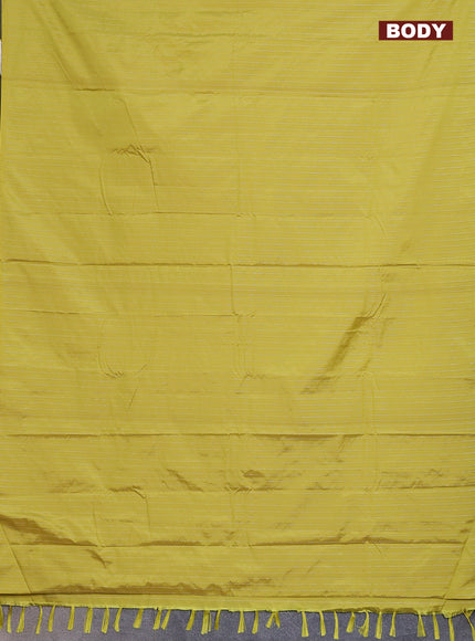 Arani semi silk saree lime yellow with allover silver zari weaves in borderless style