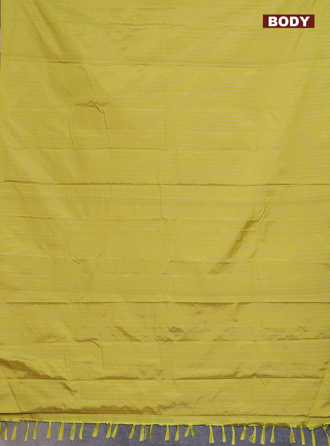 Arani semi silk saree lime yellow with allover silver zari weaves in borderless style