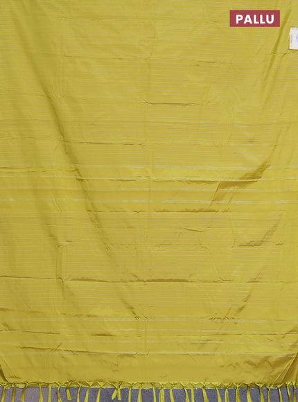 Arani semi silk saree lime yellow with allover silver zari weaves in borderless style