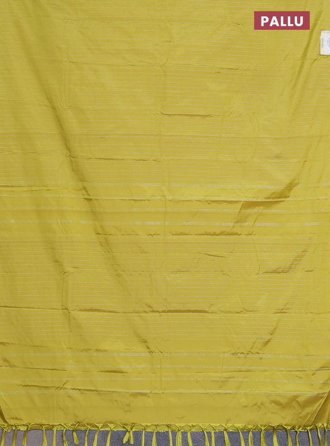 Arani semi silk saree lime yellow with allover silver zari weaves in borderless style