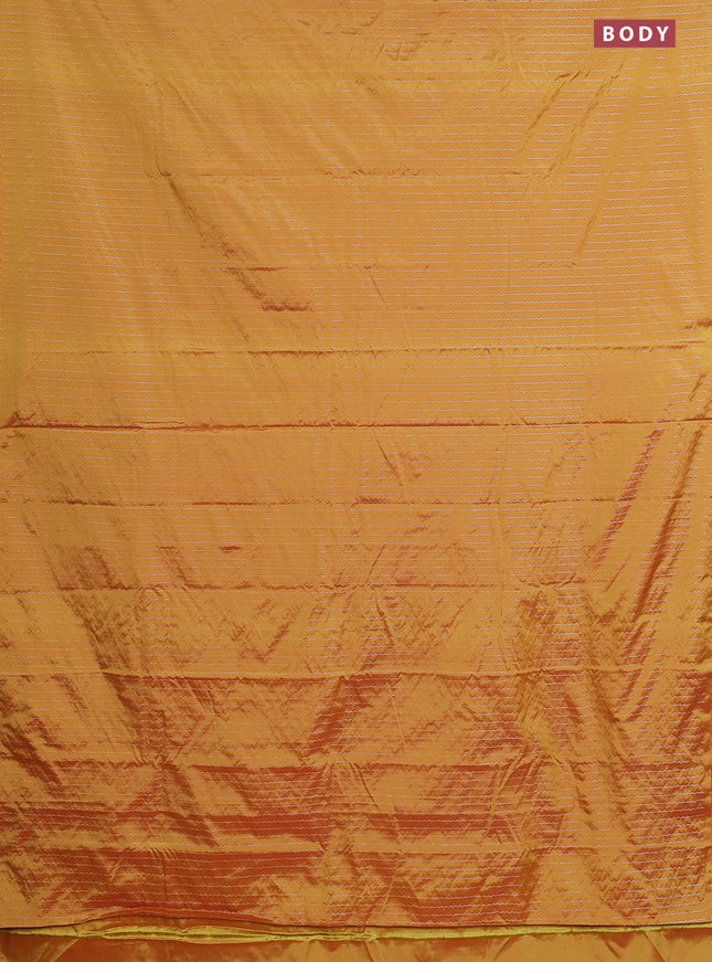 Arani semi silk saree mustard yellow with allover silver zari weaves in borderless style