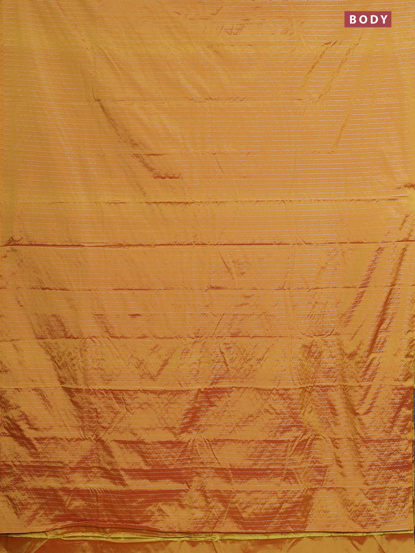 Arani semi silk saree mustard yellow with allover silver zari weaves in borderless style