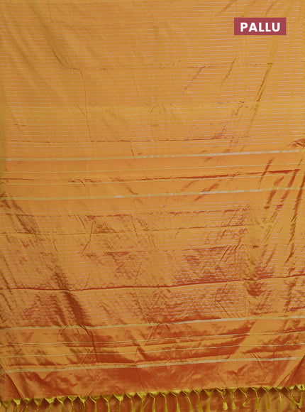 Arani semi silk saree mustard yellow with allover silver zari weaves in borderless style