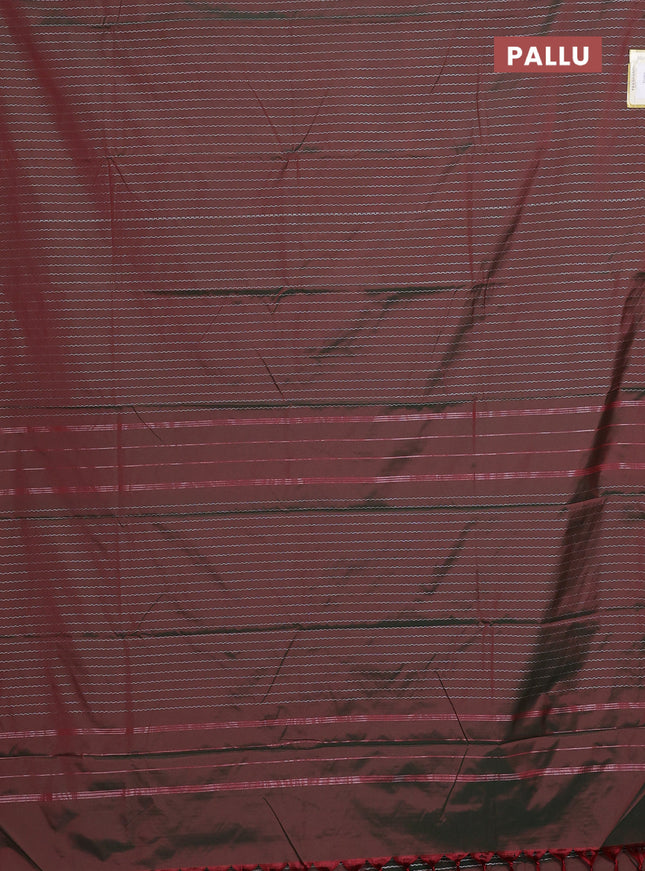 Arani semi silk saree dual shade of greenish maroon with allover silver zari weaves in borderless style