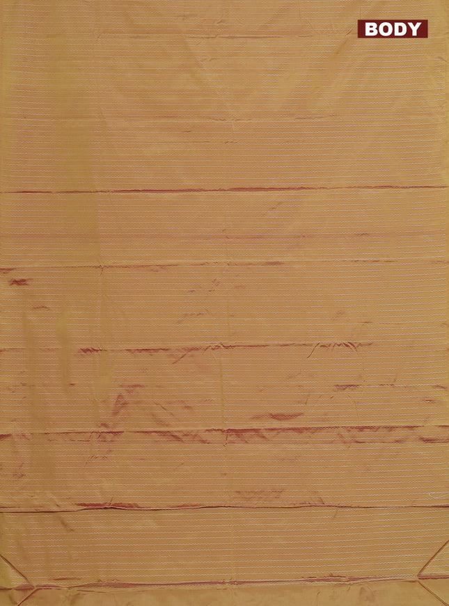 Arani semi silk saree dual shade of mustard with allover silver zari weaves in borderless style