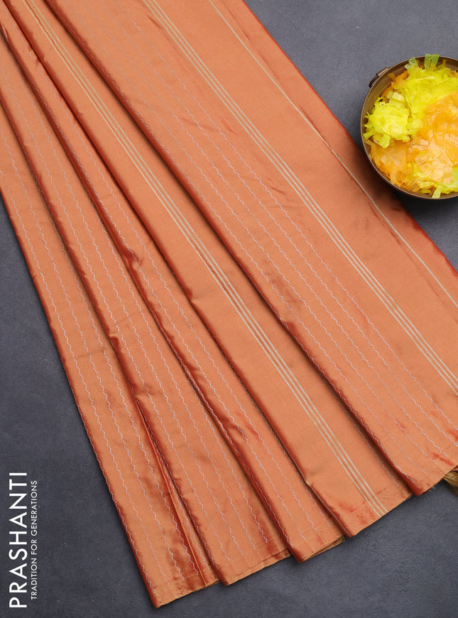 Arani semi silk saree rust shade with allover silver zari weaves in borderless style
