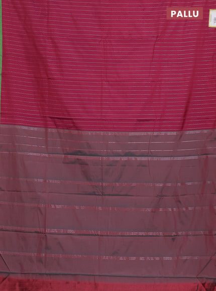 Arani semi silk saree dark magenta pink and green with allover silver zari weaves and piping border