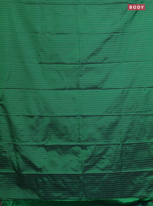 Arani semi silk saree green with allover silver zari weaves in borderless style