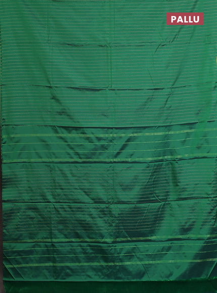 Arani semi silk saree green with allover silver zari weaves in borderless style