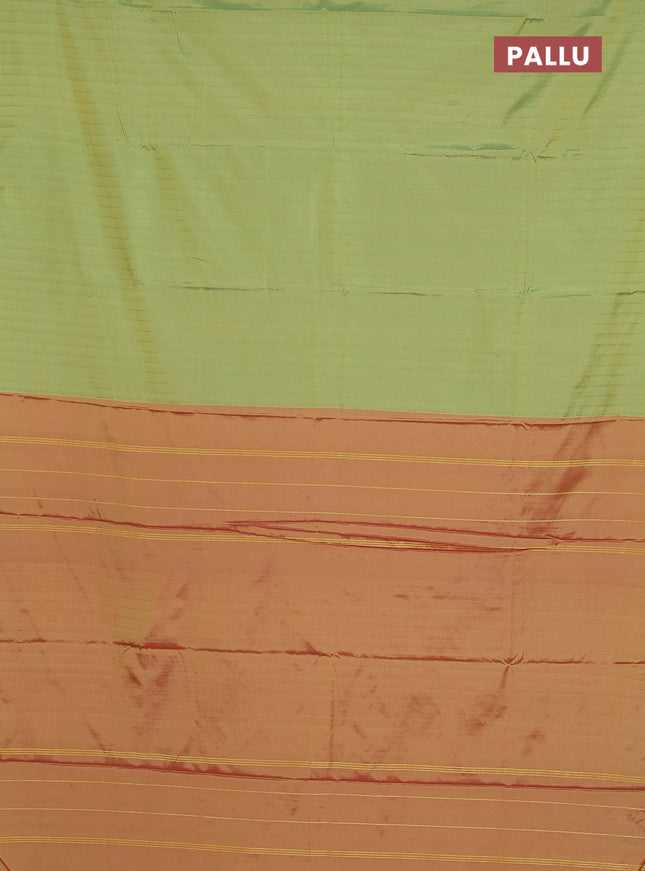 Arani semi silk saree light green with allover zari weaves in borderless style