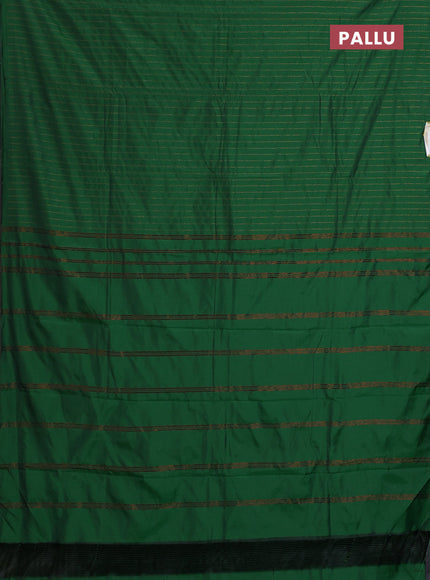 Arani semi silk saree green with allover copper zari weaves in borderless style