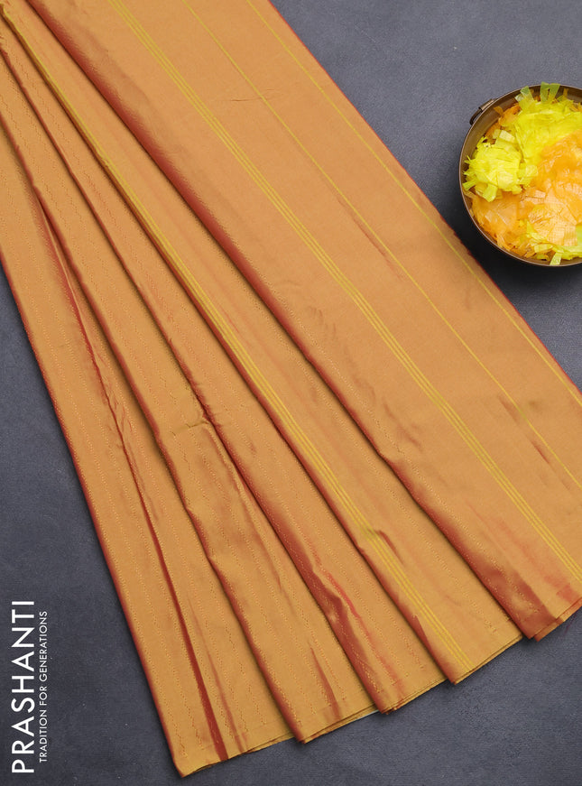 Arani semi silk saree dual shade of mustard with allover copper zari weaves in borderless style