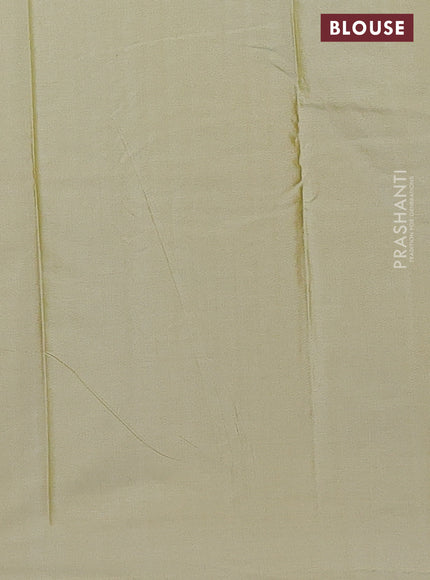 Arani semi silk saree elaichi green with allover copper zari weaves in borderless style