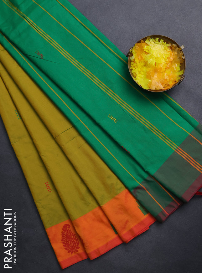 Arani semi silk saree dual shade of mustard green and green with thread woven buttas and thread woven butta border