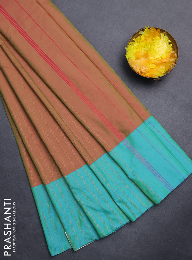 Arani semi silk saree dual shade of greenish pink and teal blue with allover copper zari weaves and copper zari woven border