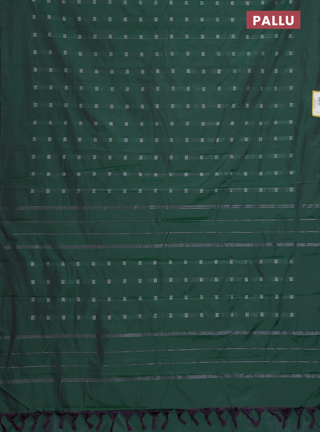 Arani semi silk saree dual shade of dark green with silver zari woven buttas in borderless style