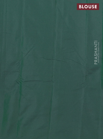 Arani semi silk saree dual shade of dark green with silver zari woven buttas in borderless style