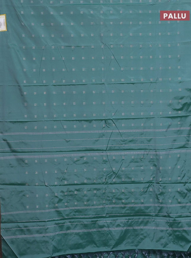 Arani semi silk saree teal green with silver zari woven buttas in borderless style