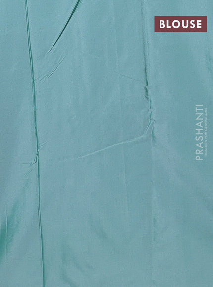 Arani semi silk saree teal green with silver zari woven buttas in borderless style