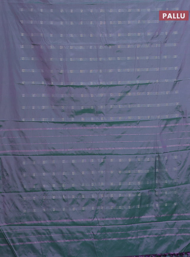 Arani semi silk saree dual shade of greenish purple with silver zari woven buttas in borderless style
