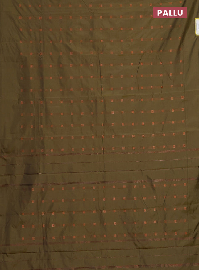 Arani semi silk saree sap green with copper zari woven buttas in borderless style