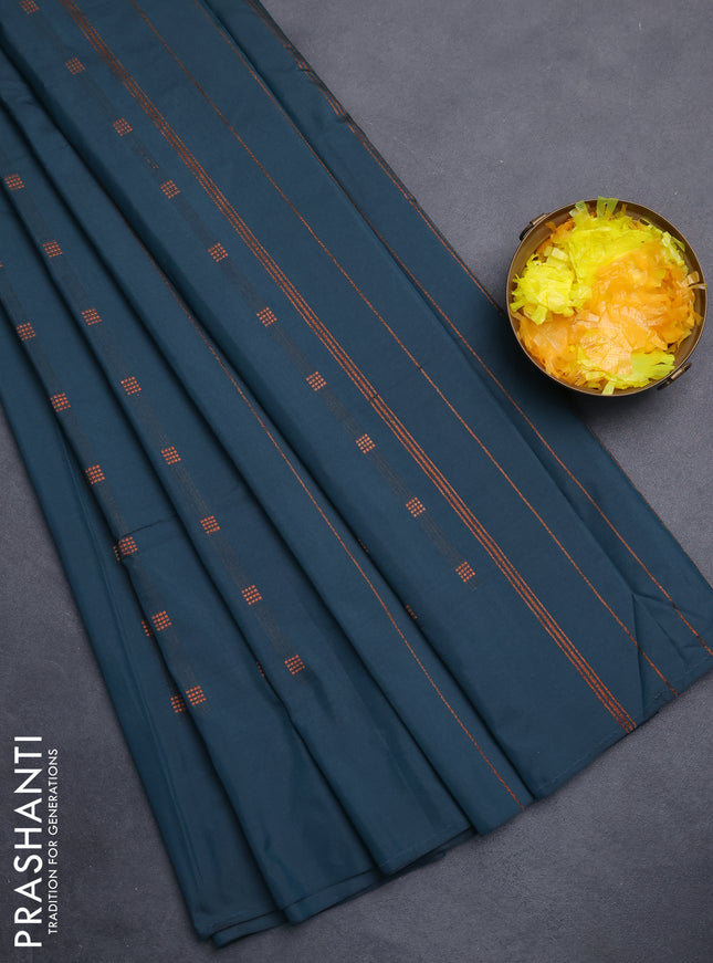 Arani semi silk saree peacock green with copper zari woven buttas in borderless style