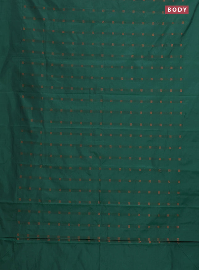 Arani semi silk saree greeen with copper zari woven buttas in borderless style