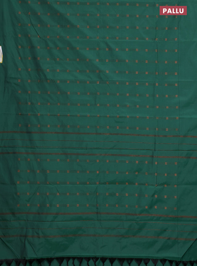 Arani semi silk saree greeen with copper zari woven buttas in borderless style