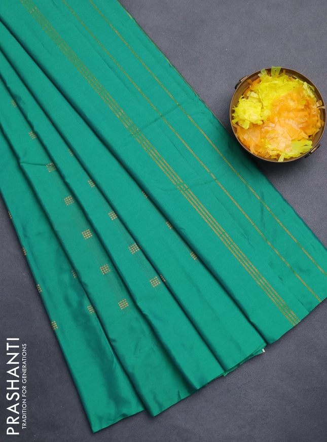 Arani semi silk saree green with copper zari woven buttas in borderless style