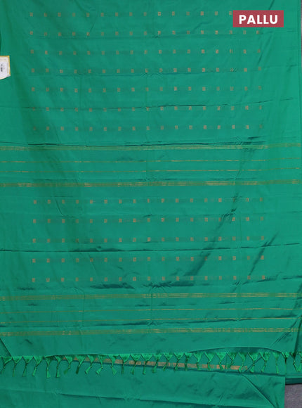 Arani semi silk saree green with copper zari woven buttas in borderless style