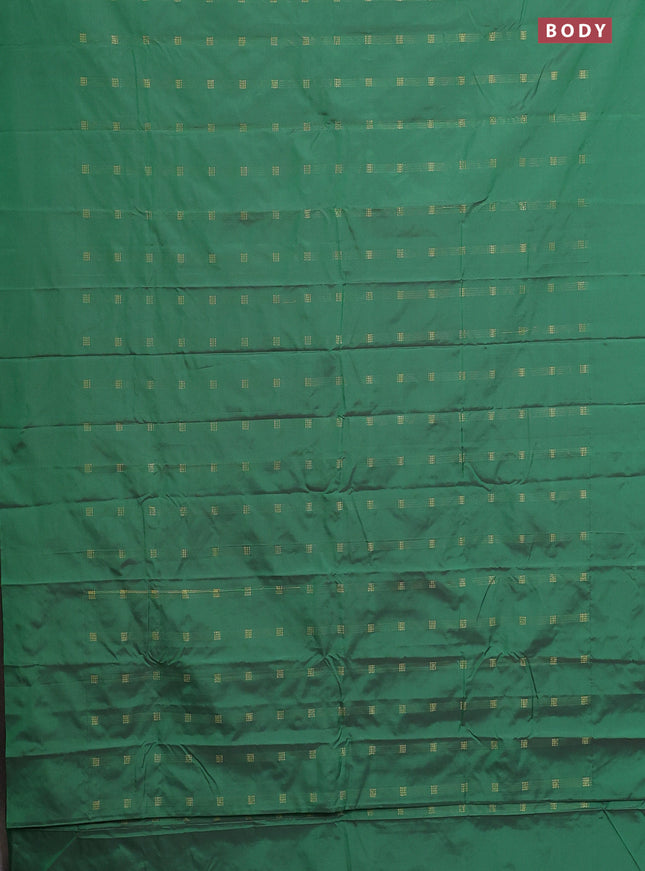 Arani semi silk saree green with zari woven buttas in borderless style