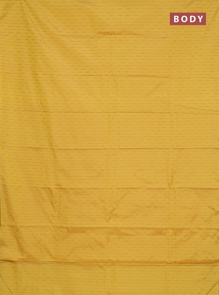 Arani semi silk saree yellow with zari woven buttas in borderless style