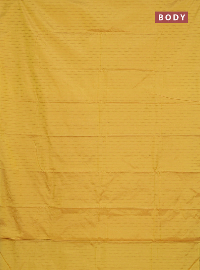 Arani semi silk saree yellow with zari woven buttas in borderless style