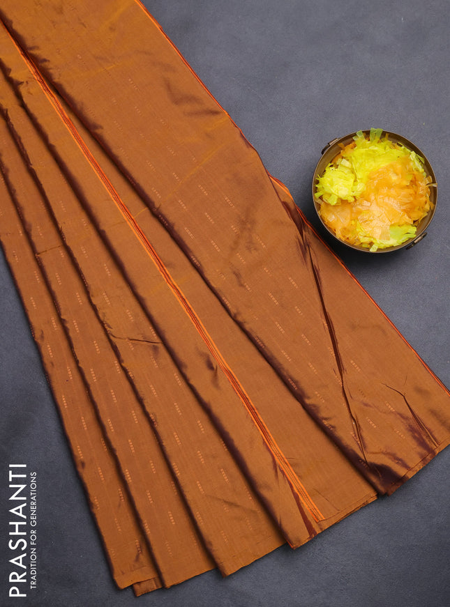 Arani semi silk saree dark mustard with zari woven buttas in borderless style