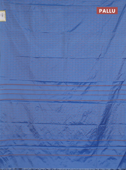 Arani semi silk saree blue shade with copper zari woven buttas in borderless style