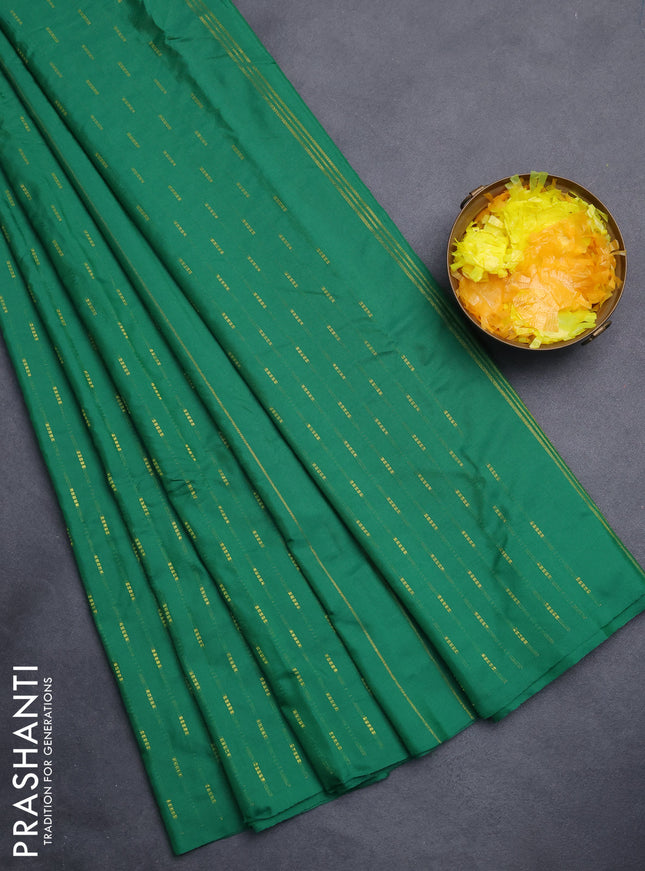 Arani semi silk saree green with zari woven buttas in borderless style