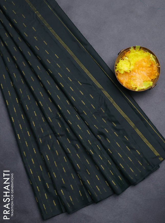 Arani semi silk saree dark green with zari woven buttas in borderless style