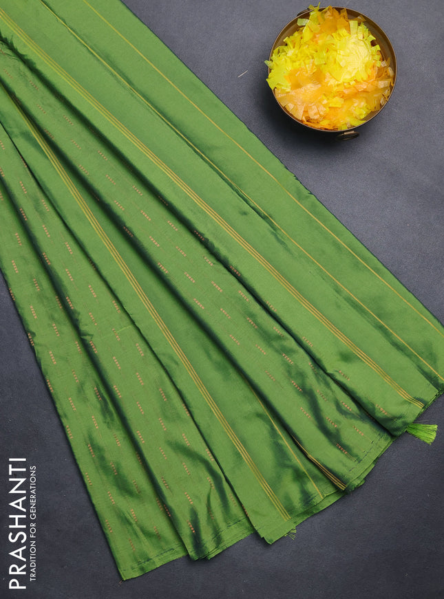 Arani semi silk saree green shade with zari woven buttas in borderless style