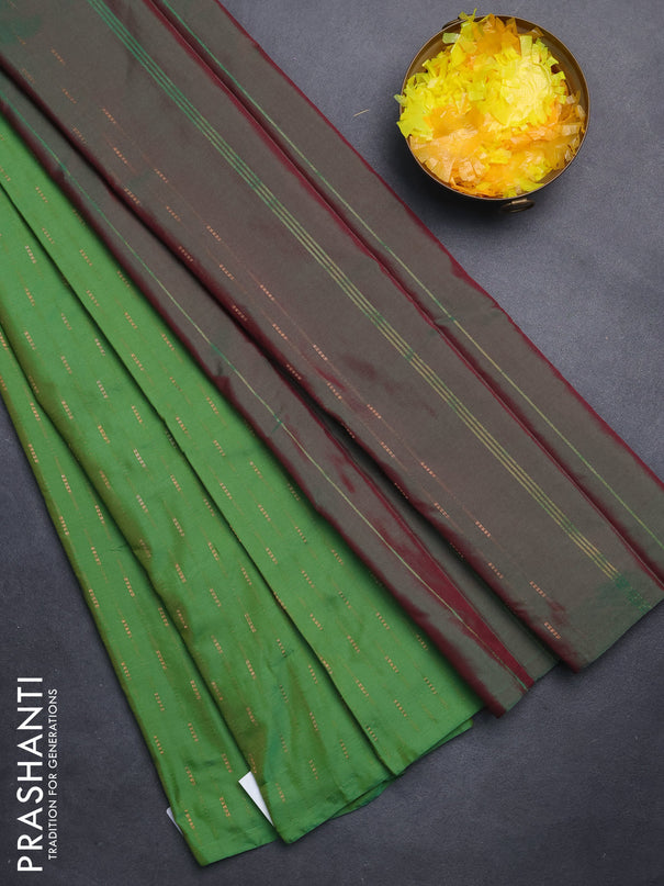 Arani semi silk saree green with zari woven buttas in borderless style
