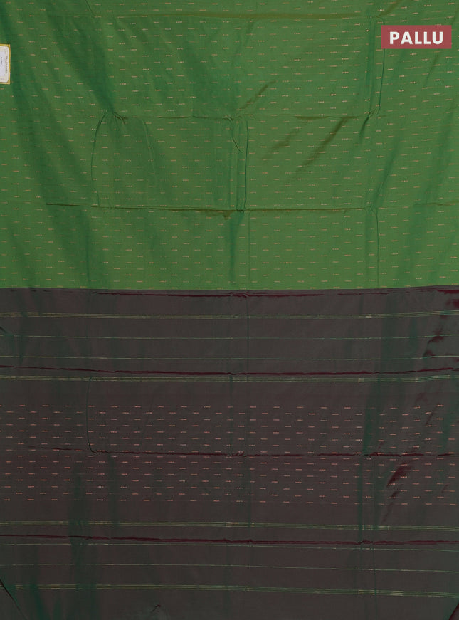 Arani semi silk saree green with zari woven buttas in borderless style