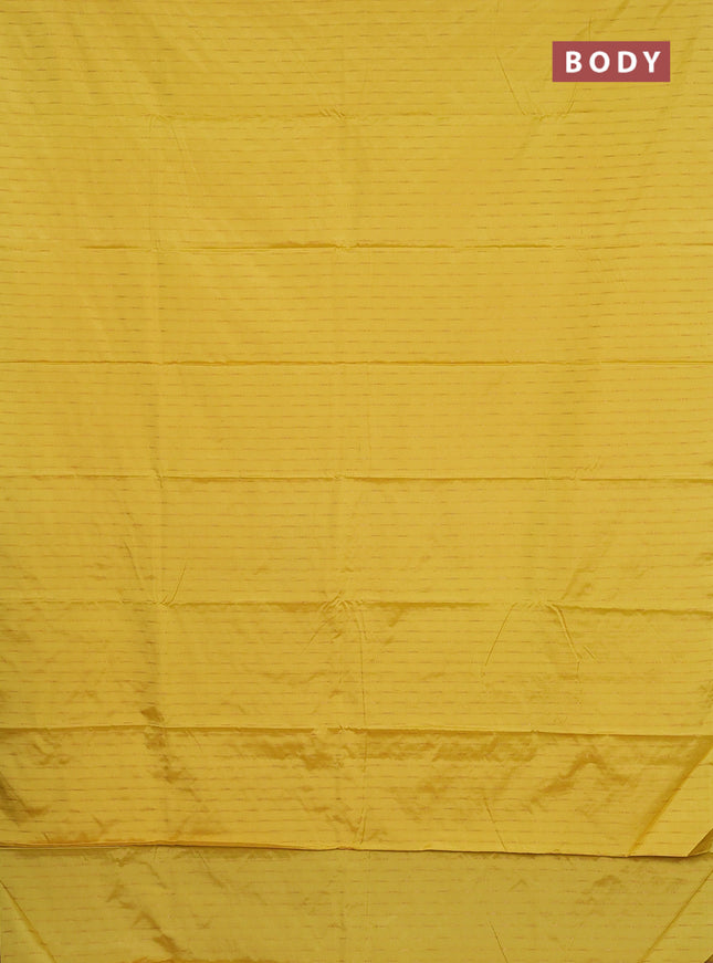 Arani semi silk saree yellow with zari woven buttas in borderless style