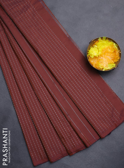 Arani semi silk saree rustic brown with allover silver zari weaves in borderless style
