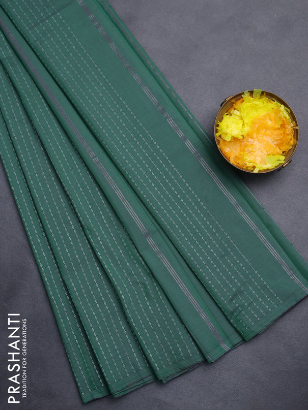 Arani semi silk saree green with allover silver zari weaves in borderless style