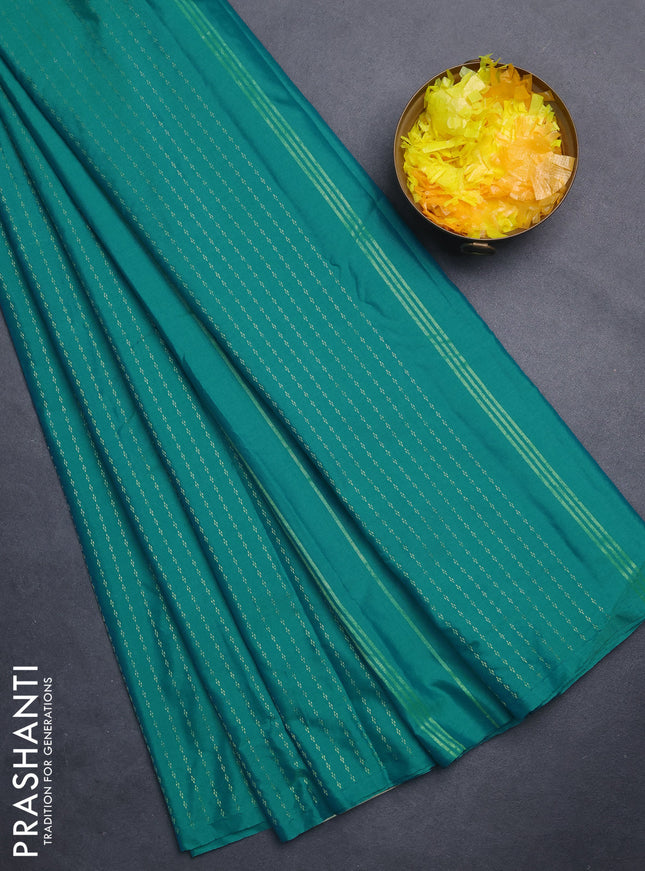 Arani semi silk saree teal blue shade with allover zari weaves in borderless style