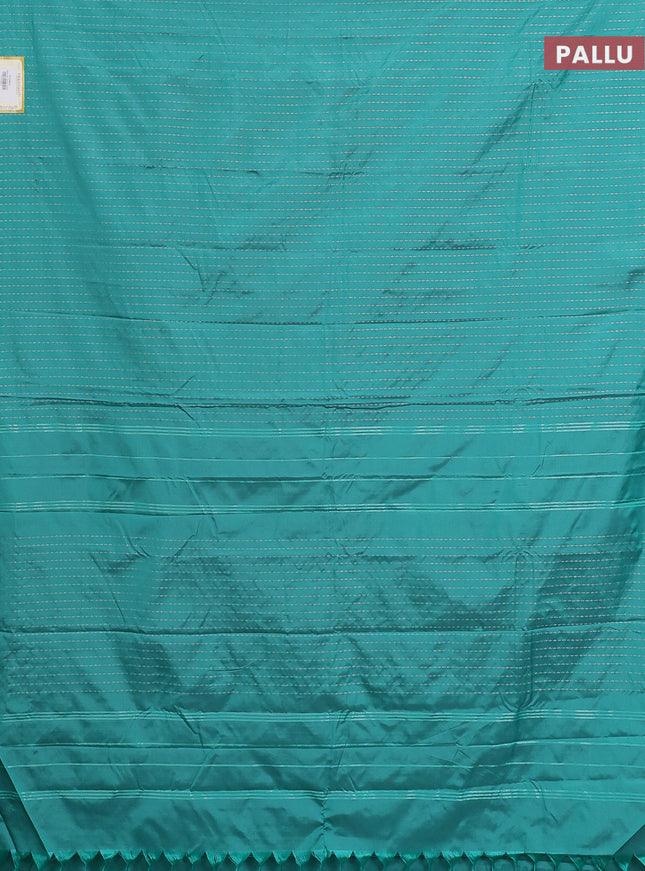 Arani semi silk saree teal green with allover silver zari weaves in borderless style