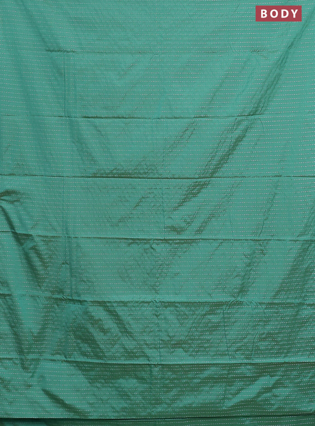 Arani semi silk saree teal green with allover silver zari weaves in borderless style