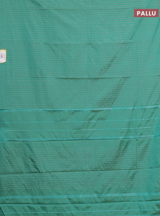 Arani semi silk saree teal green with allover silver zari weaves in borderless style