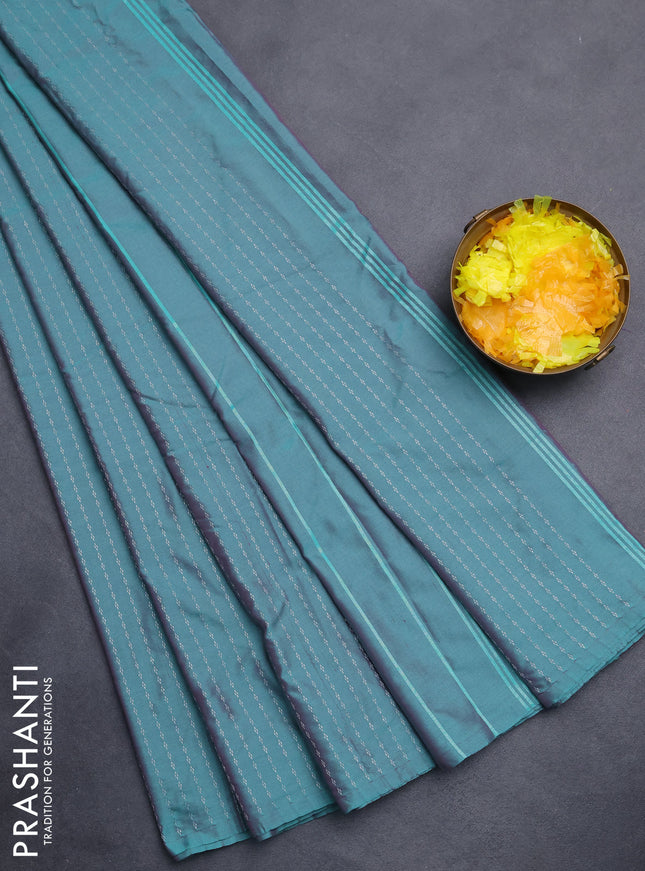Arani semi silk saree dual shade of teal green with allover silver zari weaves in borderless style